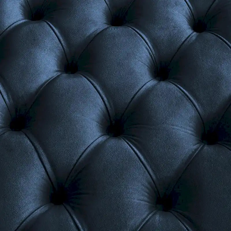 Pouf rond touffeté en velours et finition dorée